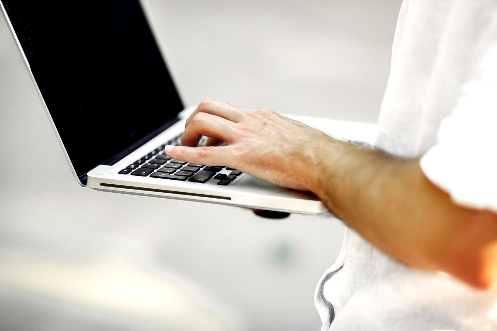 Early game development workshop showing students working on 3D models