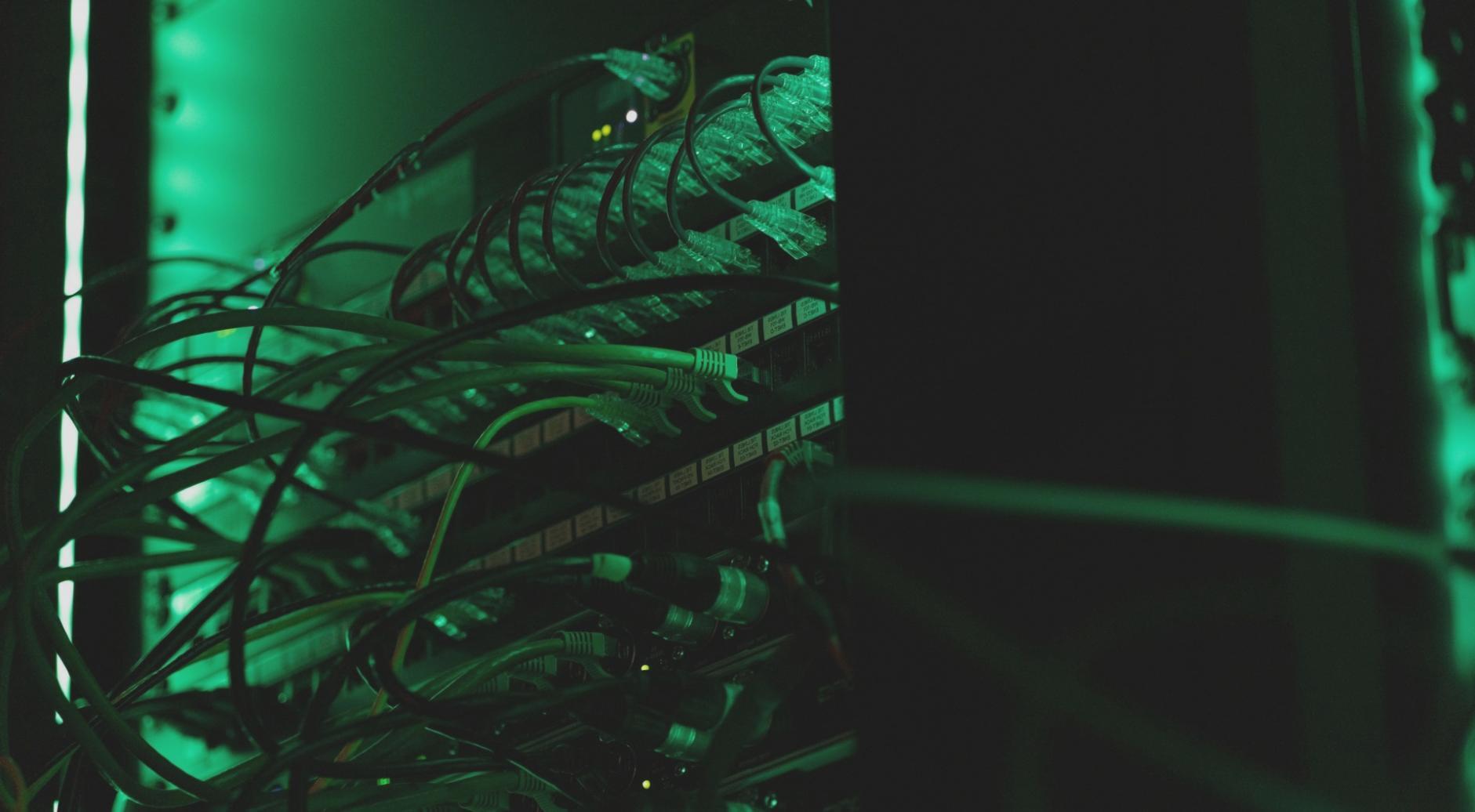 Students collaborating on game design projects in a modern learning environment